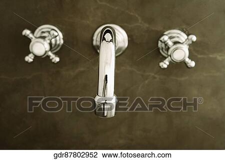 Faucets in a bathroom View Large Photo Image Stock Image - Faucets in a bathroom. Fotosearch