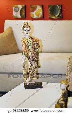 Stock Photo - Figurines on a table. Fotosearch