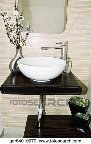 Flower vase near a sink View Large Photo Image Stock Photo - Flower vase near a sink. Fotosearch