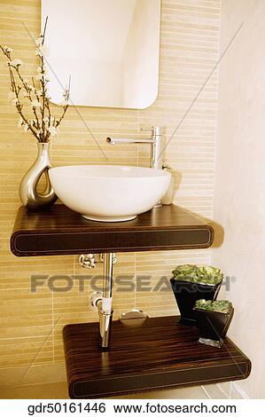 Stock Photograph - Flower vase near a sink. Fotosearch