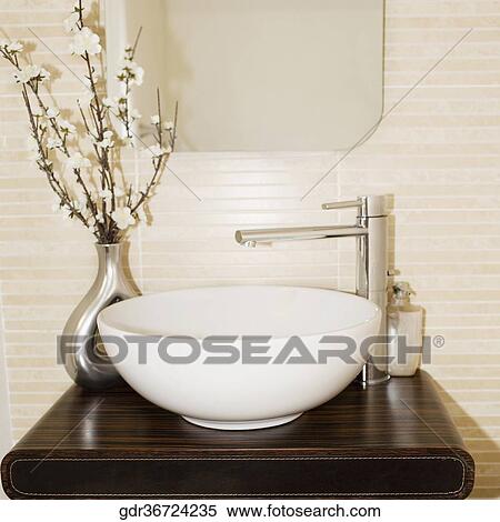 Flower vase near a sink View Large Photo Image Stock Photography - Flower vase near a sink. Fotosearch