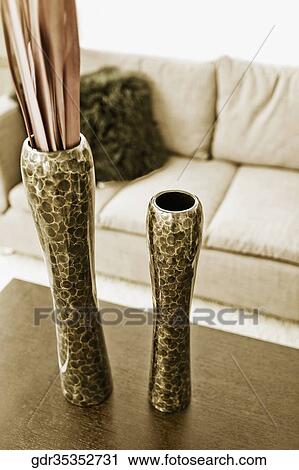 Flower vases on a table View Large Photo Image Stock Image - Flower vases on a table. Fotosearch