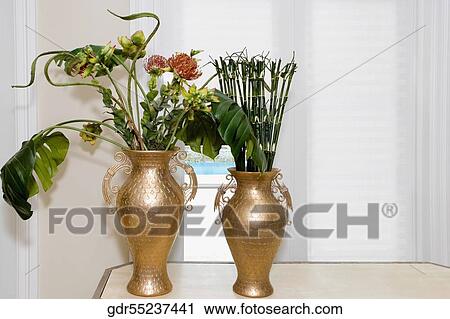 Flower vases on a table View Large Photo Image Stock Image - Flower vases on a table. Fotosearch