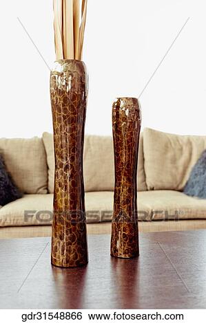 Flower vases on a table View Large Photo Image Stock Photograph - Flower vases on a table. Fotosearch