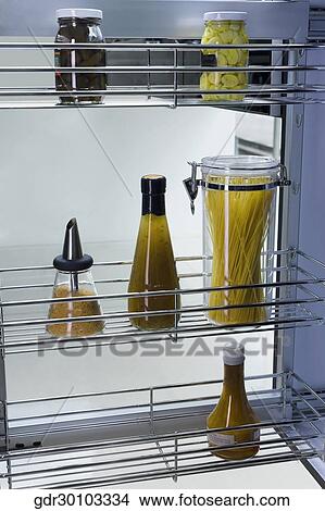 Foodstuffs on shelves View Large Photo Image Picture - Foodstuffs on shelves. Fotosearch