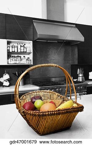 Fruit basket on a table View Large Photo Image Stock Photo - Fruit basket on a table. Fotosearch