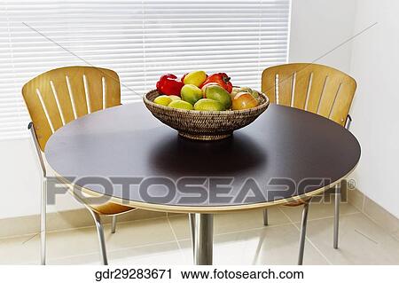 Stock Image - Fruits and vegetables on a table. Fotosearch