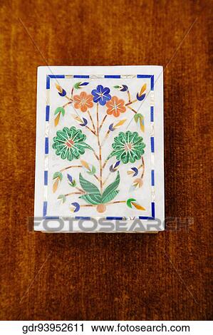 High angle view of a box on a table View Large Photo Image Stock Image - High angle view of a box on a table. Fotosearch