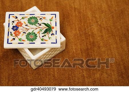 High angle view of a box on a table View Large Photo Image Stock Photo - High angle view of a box on a table. Fotosearch