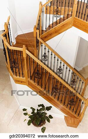Stock Image - High angle view of a staircase in a house. Fotosearch