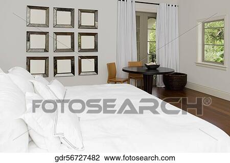 Stock Image - Interiors of a bedroom. Fotosearch