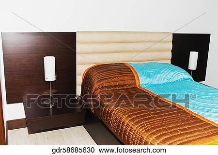 Stock Image - Interiors of a bedroom. Fotosearch