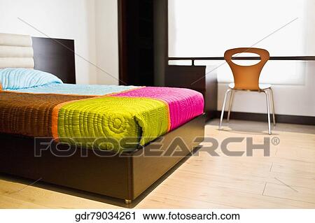 Stock Image - Interiors of a bedroom. Fotosearch