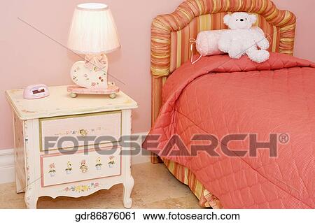 Stock Image - Interiors of a bedroom. Fotosearch