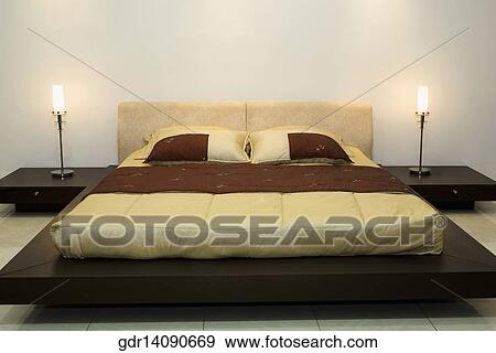 Stock Photo - Interiors of a bedroom. Fotosearch