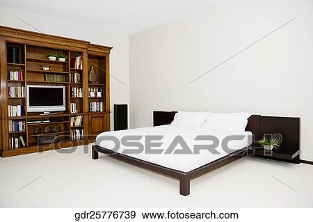 Stock Photo - Interiors of a bedroom. Fotosearch