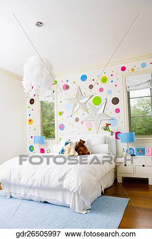 Stock Photo - Interiors of a bedroom. Fotosearch