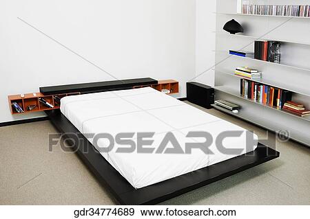 Interiors of a bedroom View Large Photo Image Stock Photo - Interiors of a bedroom. Fotosearch