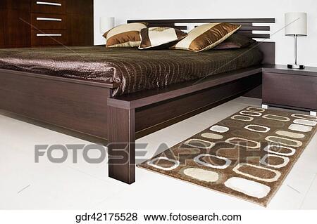 Stock Photo - Interiors of a bedroom. Fotosearch