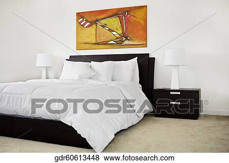 Stock Photo - Interiors of a bedroom. Fotosearch