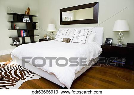 Interiors of a bedroom View Large Photo Image Stock Photo - Interiors of a bedroom. Fotosearch