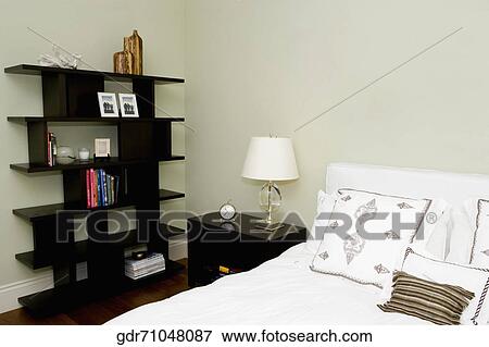 Interiors of a bedroom View Large Photo Image Stock Photo - Interiors of a bedroom. Fotosearch