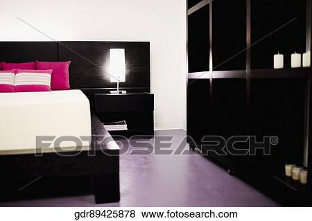 Interiors of a bedroom View Large Photo Image Stock Photo - Interiors of a bedroom. Fotosearch