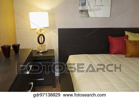 Interiors of a bedroom View Large Photo Image Stock Photo - Interiors of a bedroom. Fotosearch