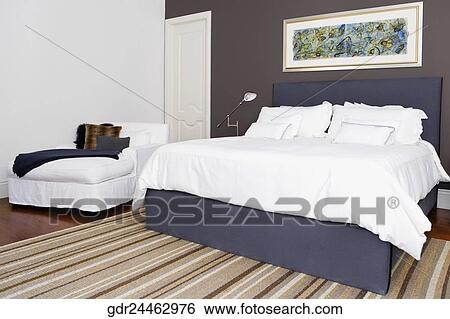 Interiors of a bedroom View Large Photo Image Stock Photograph - Interiors of a bedroom. Fotosearch