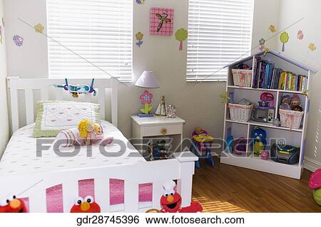 Interiors of a bedroom View Large Photo Image Stock Photograph - Interiors of a bedroom. Fotosearch