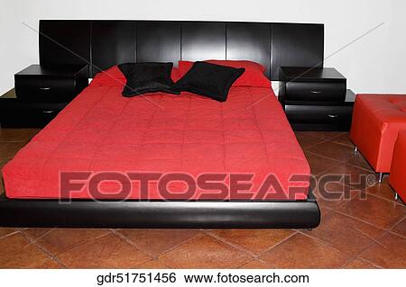 Interiors of a bedroom View Large Photo Image Stock Photograph - Interiors of a bedroom. Fotosearch
