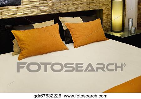Stock Photograph - Interiors of a bedroom. Fotosearch