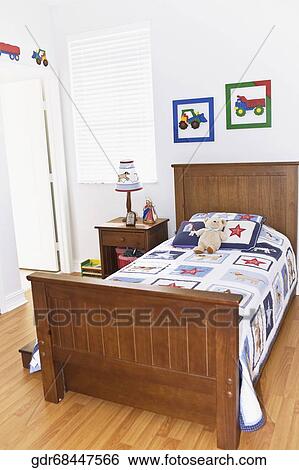 Interiors of a bedroom View Large Photo Image Stock Photograph - Interiors of a bedroom. Fotosearch