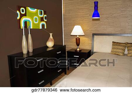 Interiors of a bedroom View Large Photo Image Stock Photograph - Interiors of a bedroom. Fotosearch