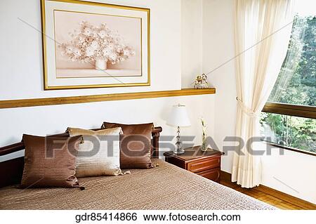 Interiors of a bedroom View Large Photo Image Stock Photograph - Interiors of a bedroom. Fotosearch