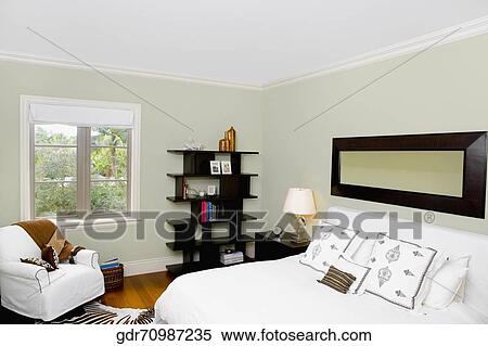 Interiors of a bedroom View Large Photo Image Stock Photography - Interiors of a bedroom. Fotosearch