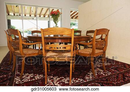 Stock Image - Interiors of a dining room. Fotosearch