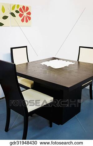 Stock Image - Interiors of a dining room. Fotosearch