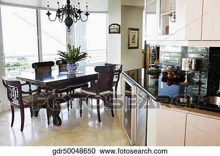 Interiors of a dining room View Large Photo Image Stock Image - Interiors of a dining room. Fotosearch