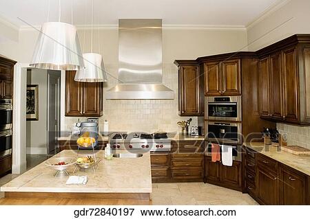 Stock Photo - Interiors of a domestic kitchen. Fotosearch