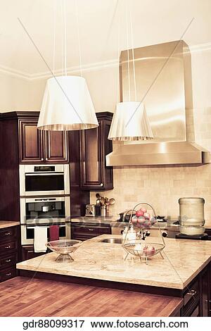 Stock Photo - Interiors of a domestic kitchen. Fotosearch