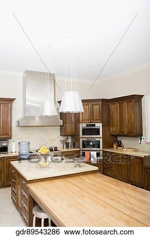 Interiors of a domestic kitchen View Large Photo Image Stock Photograph - Interiors of a domestic kitchen. Fotosearch
