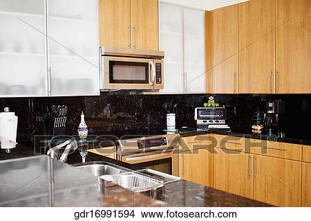 Interiors of a kitchen View Large Photo Image Picture - Interiors of a kitchen. Fotosearch