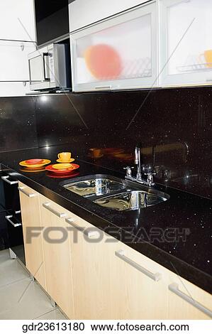 Stock Image - Interiors of a kitchen. Fotosearch