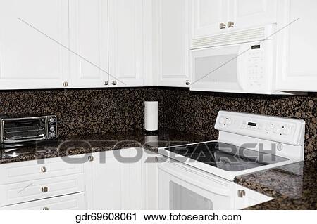 Stock Image - Interiors of a kitchen. Fotosearch