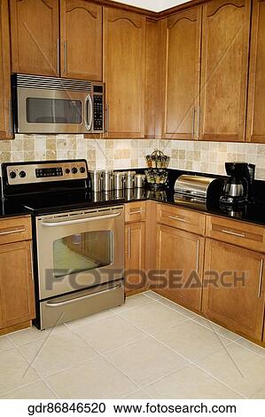 Interiors of a kitchen View Large Photo Image Stock Image - Interiors of a kitchen. Fotosearch