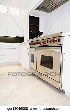 Stock Photo - Interiors of a kitchen. Fotosearch
