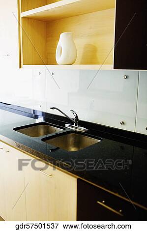 Stock Photo - Interiors of a kitchen. Fotosearch