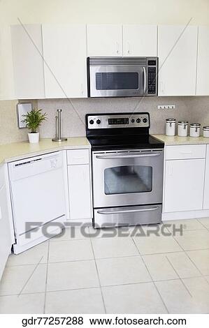 Stock Photo - Interiors of a kitchen. Fotosearch