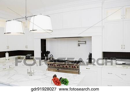Stock Photo - Interiors of a kitchen. Fotosearch